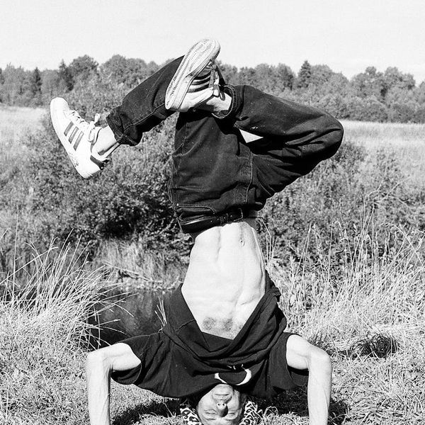 Athletic man in a dynamic pose symbolizing core strength.